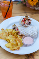 Shawarma with beef, vegetables, chips and sauce