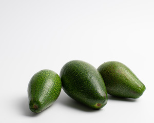 avocados on white background