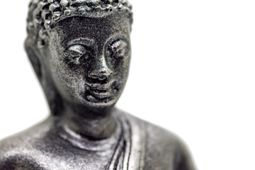 Fototapeta na wymiar Face of little buddha figurine