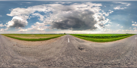 full seamless spherical hdri panorama 360 degrees angle view on asphalt road among fields in summer day with awesome clouds in equirectangular projection, ready for VR AR virtual reality content