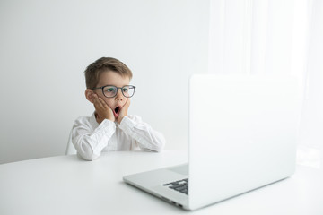 Young businessman working with laptop at office