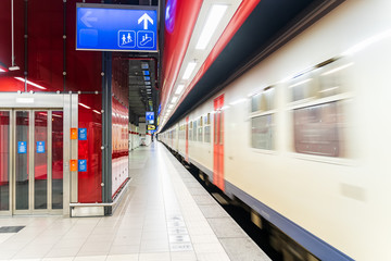Empty subway station with speeding train, Brussels Belgium