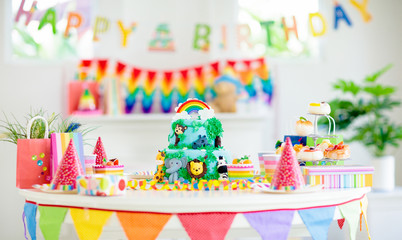 Kids birthday cake. Child jungle theme party.