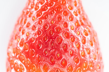 close up view of ripe red strawberry on white background