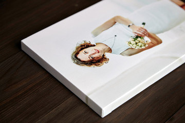 Photo canvas print with gallery wrapping. Photography of woman stretched on stretcher bar, lateral side. Wall decor