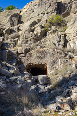 Cave of an old mine excavated in the naked rock