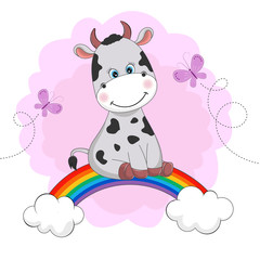 Funny happy cute cow is sitting on a rainbow.