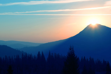 juicy sunrise on top of a mountain. amazing nature and landscapes