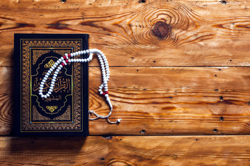 Muslims holy book Koran. Translation: The Holy Quran
