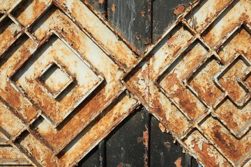 rust texture at the gate of the house 