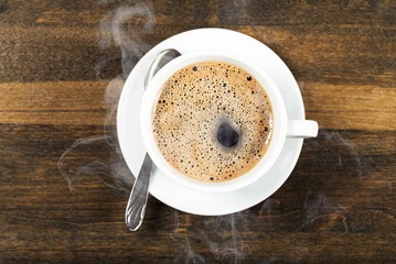 Coffee cup  on wooden background