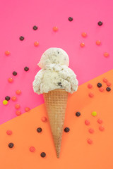 Cookies and Cream Ice Cream Cone on Vibrant Background - 270114771