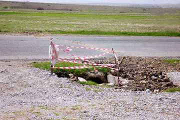 Road closed sign before the road construction.