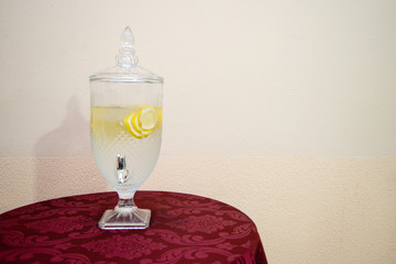 Water flavored with yellow lemon.