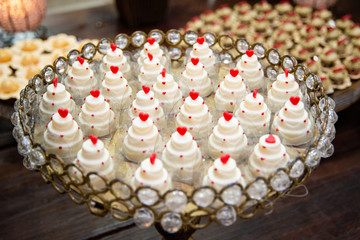 Sweet table at wedding party. Various sweets.