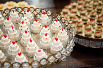 Sweet table at wedding party. Various sweets.