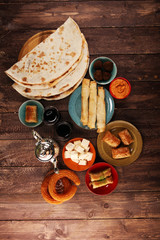 Middle eastern or arabic dishes and assorted meze, concrete rustic background. Turkish Bread or...