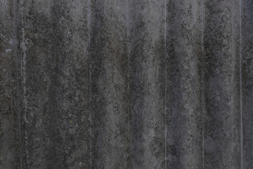 old asbestine worn moss-worn mossy worn slate extracted from the background in the shade