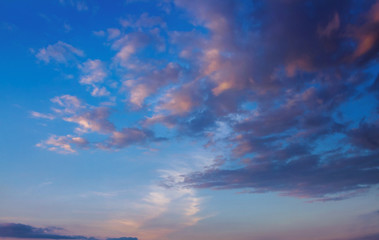 Blue sky with clouds . Background