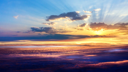 Beautiful sunrise .   Beautiful heavenly landscape with the sun in the clouds  .