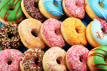donuts in different glazes with chocolate