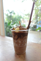 Chocolate shaker in the plastic glass