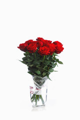 red roses bouquet on white background, fifteen flowers