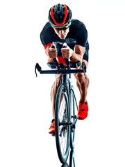 Obraz na płótnie Canvas triathlete triathlon Cyclist cycling in studio silhouette shadow isolated on white background