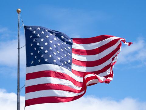 Close Up of an Unfurled American Flag on a Sunny Day