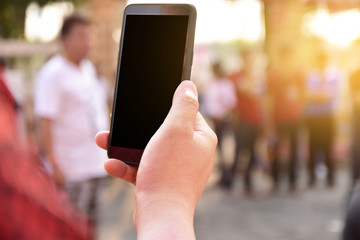 People holding Mobile Smart Phone Take Photo And Live VDO streaming