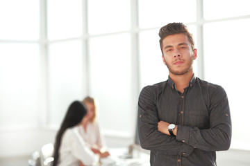 young business man standing in his office