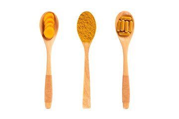 Set of Turmeric sliced (Curcuma longa Linn)With finely powder and casules in wooden spoon isolated on white background.Top view