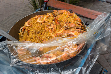 Rice with seafood for sale in the streets of Cartagena. Colombia.
