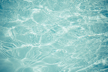 swimming pool with sunny reflections