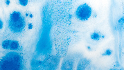 Abstract blue watercolor background. Splashes and strokes. High resolution texture. Modern Art. Hand drawing. Elements for creating brushes and textures. Sky blue