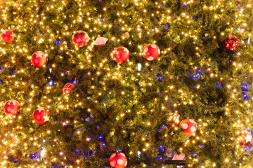 Obraz na płótnie Canvas Decorative Christmas balls and Christmas tree with light