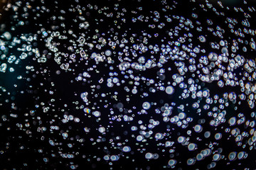 Colorful blur bokeh defocused on black