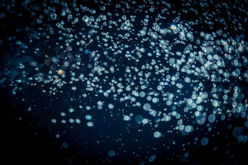 Colorful blur bokeh defocused on black