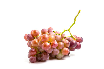 Fototapeta premium Bunch of red grapes isolated on white