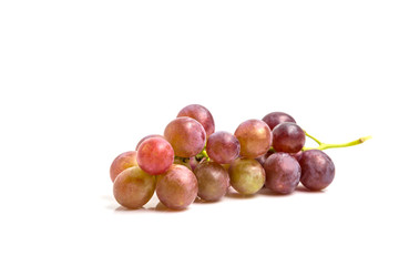 Bunch of red grapes isolated on white