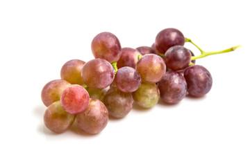 Bunch of red grapes isolated on white