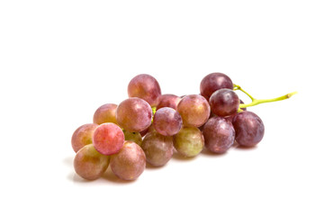 Bunch of red grapes isolated on white