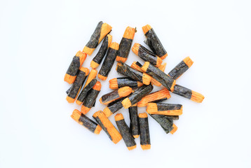 Nori maki arare japanese rice crackers in seaweed on white background.
