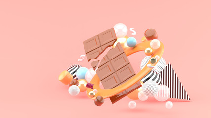 Chocolate Bar Among the colorful balls on the pink background.-3d rendering.