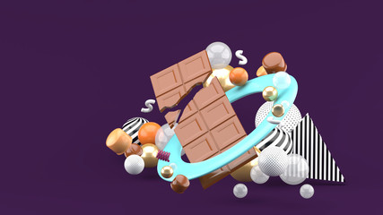 Chocolate Bar Among the colorful balls on the purple background.-3d rendering.