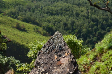 mountain valleys captured from a focusing a rock 