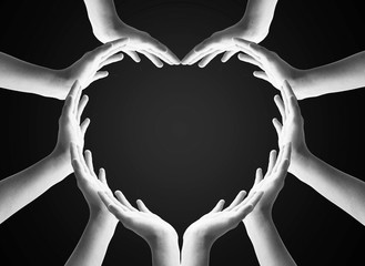 International Human Solidarity Day concept: Collaborative human hands grouped in heart shape