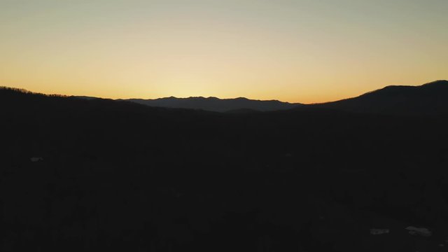 Silhouette Landscape Sunrise over Tennessee Mountains Cherokee Valley Slow Motion Drone Shot