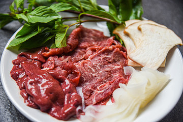 Set of meat beef slice liver and mushroom vegetables for cooked or Sukiyaki Shabu shabu Japanese foods