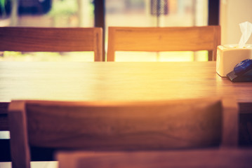 Empty wood table in coffee shop.